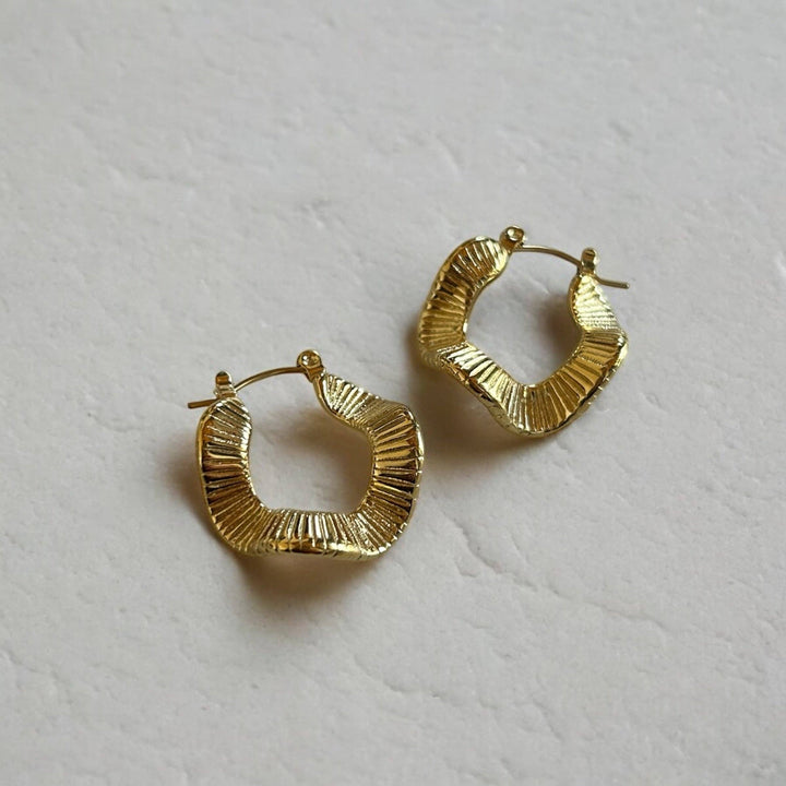 Pre-Order: Lyra Wavy Hoop Earrings — Gold